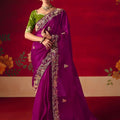 Magenta Purple Heavy Embroidered Saree with Contrast Green Blouse 