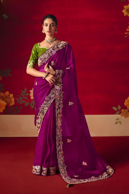 Magenta Purple Heavy Embroidered Saree with Contrast Green Blouse 