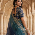 Teal Blue Ombre Organza Saree with Heavy Zari Embroidered Border