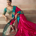 Rani Pink Silk Saree with Teal Green Zari Border Traditional