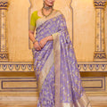 Lavender Banarasi Silk Saree With Golden Zari Contrast Green Blouse