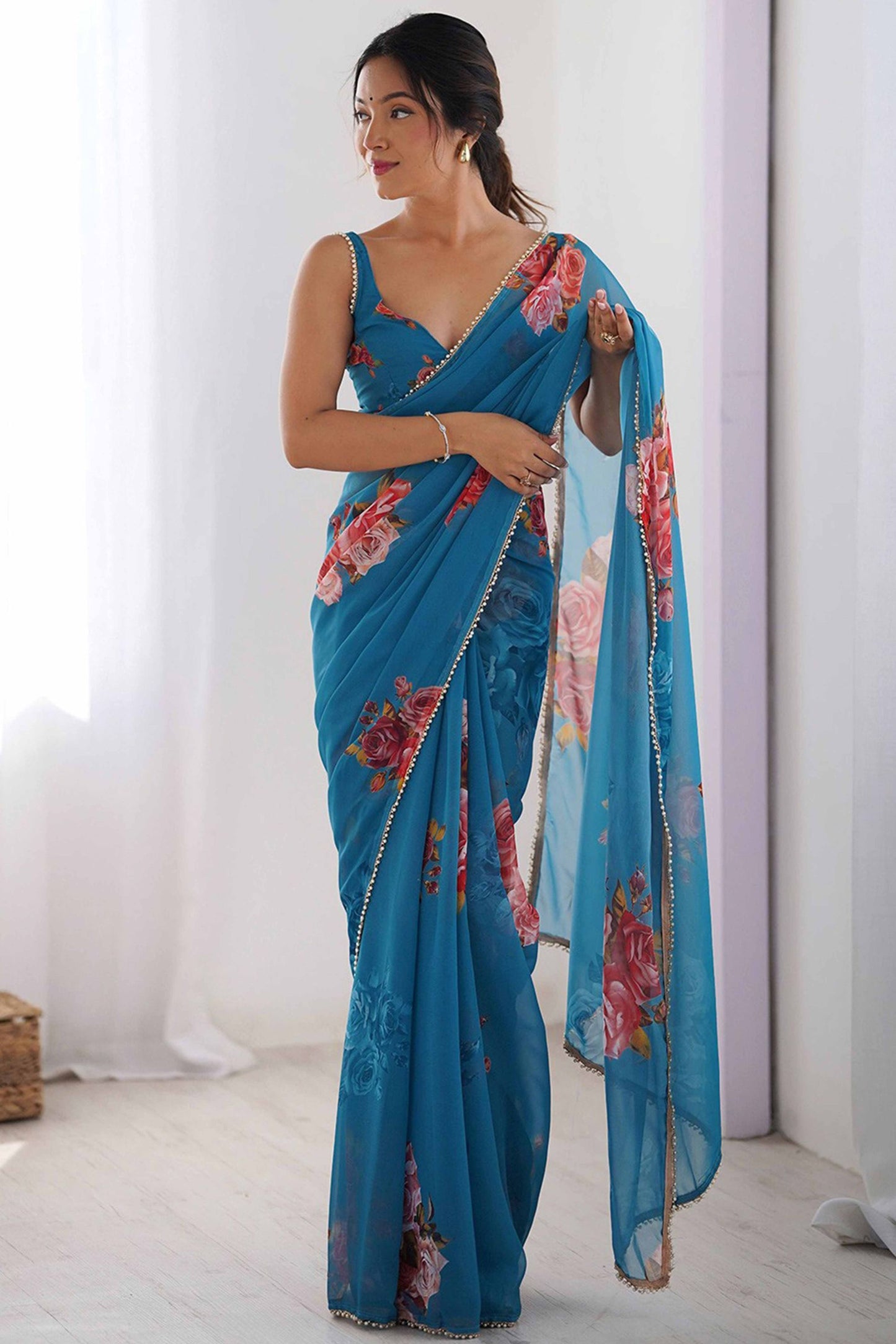 Teal Blue Floral Georgette Saree with Designer Border