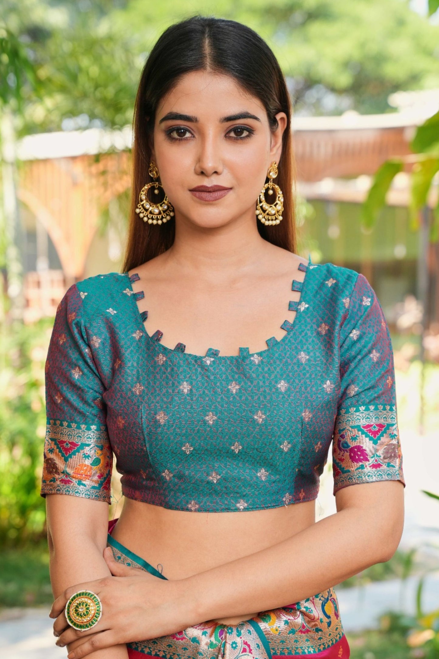 Rani Pink Silk Saree Teal Border Multicolor Peacock Weaving Work