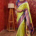 Parrot Green Kanjivaram Silk Saree Gold Zari Border Butti Work