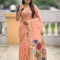 Peach Linen Silk Saree with Multicolor Floral Print Woven Border
