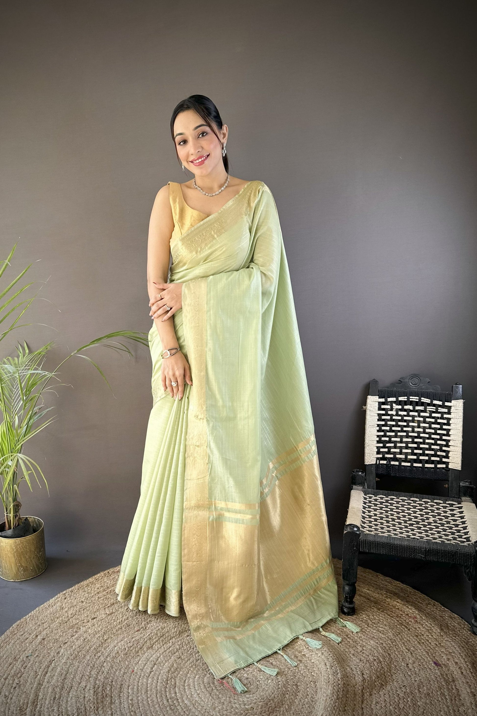 Mint Green Linen Silk Saree with Golden Zari Border Tassel Pallu