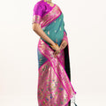 Teal Green Paithani Silk Saree with Pink Border Floral Zari Woven Pallu