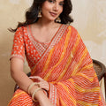 Orange Georgette Saree with Golden Embroidered Border Designer Blouse