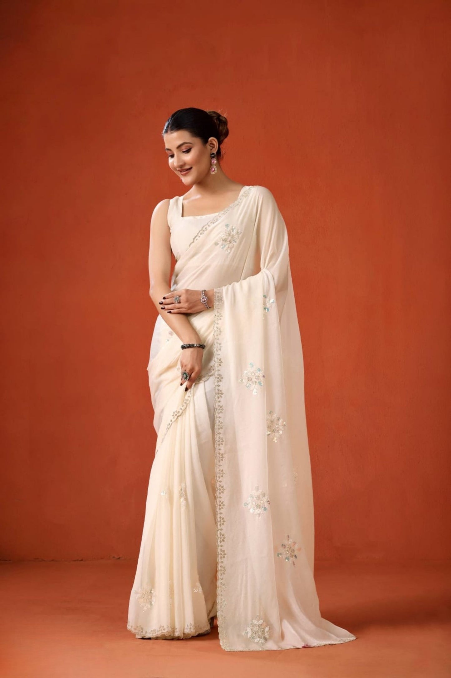 Cream Embroidered Georgette Saree Floral Motifs Designer Border