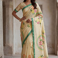 Cream Printed Linen Silk Saree Floral Design and Green Border