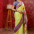 Parrot Green Kanjivaram Silk Saree Gold Zari Border Butti Work