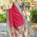 Rani Pink Silk Saree Teal Border Multicolor Peacock Weaving Work