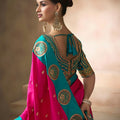 Rani Pink Silk Saree with Teal Green Zari Border Traditional