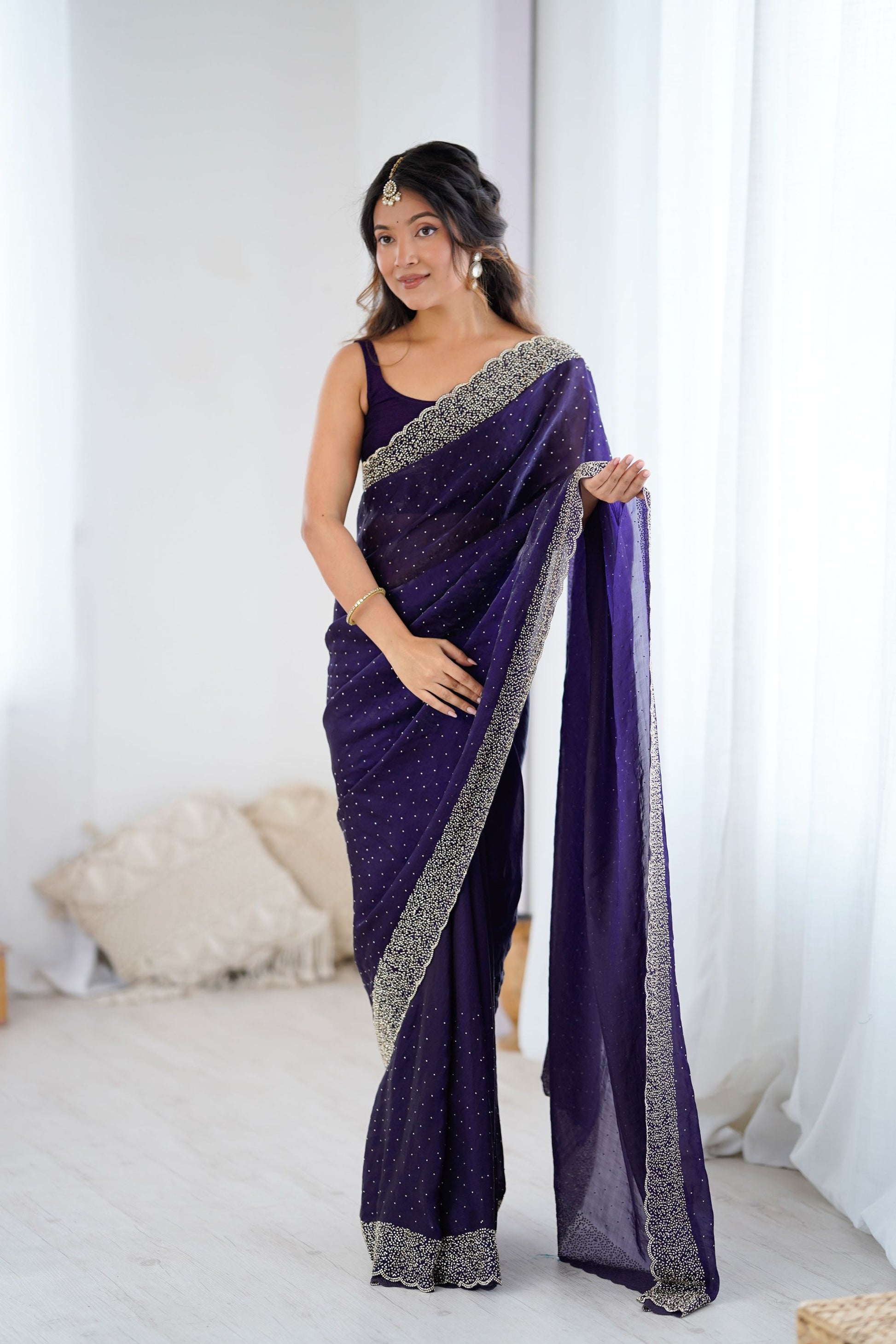 Designer Purple Georgette Saree with Heavy Embellished Border