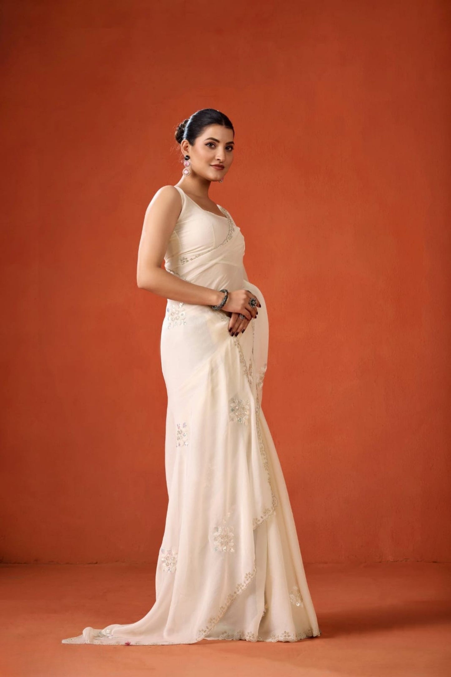 Cream Embroidered Georgette Saree Floral Motifs Designer Border