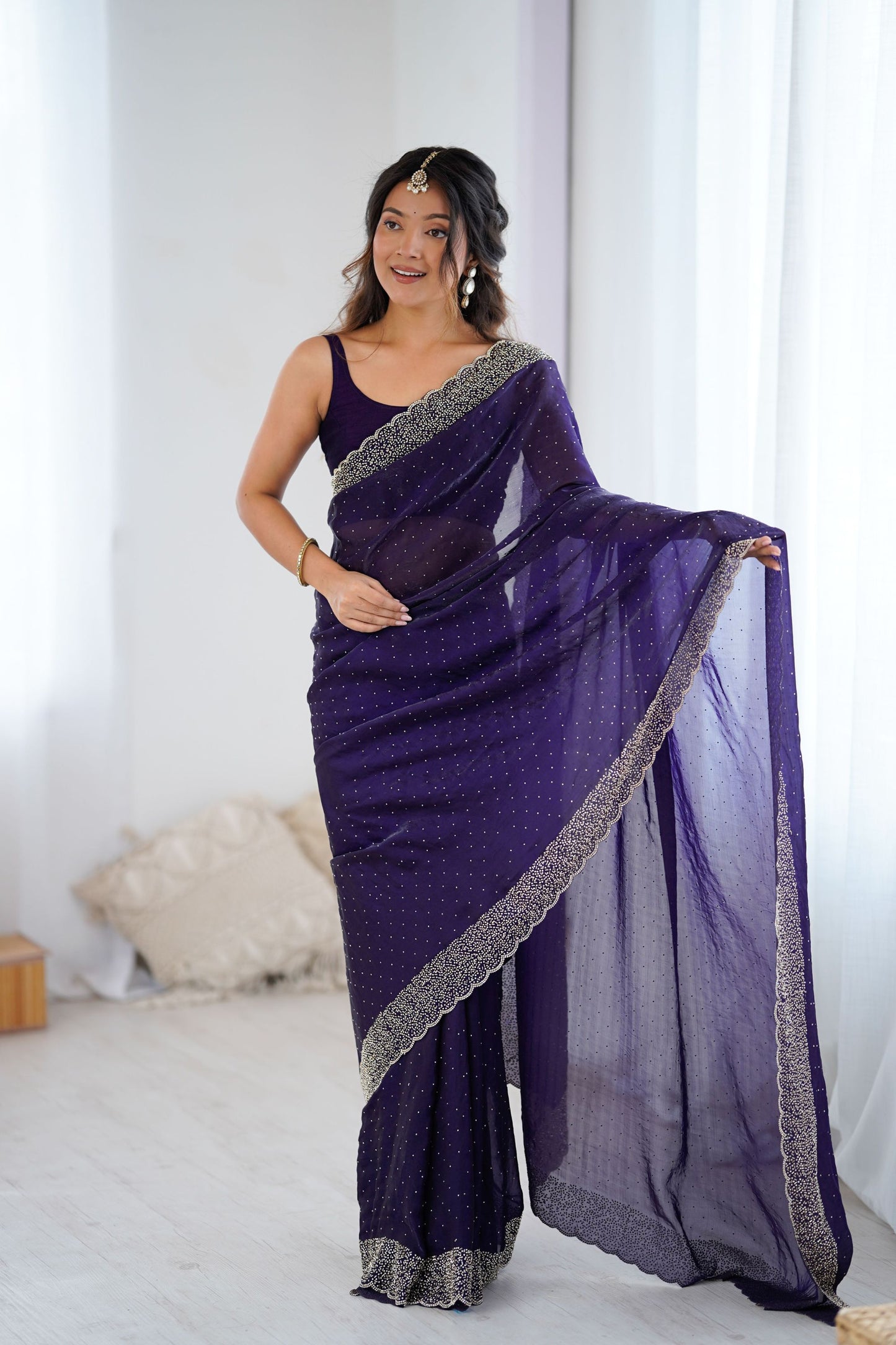 Designer Purple Georgette Saree with Heavy Embellished Border