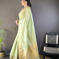 Mint Green Linen Silk Saree with Golden Zari Border Tassel Pallu