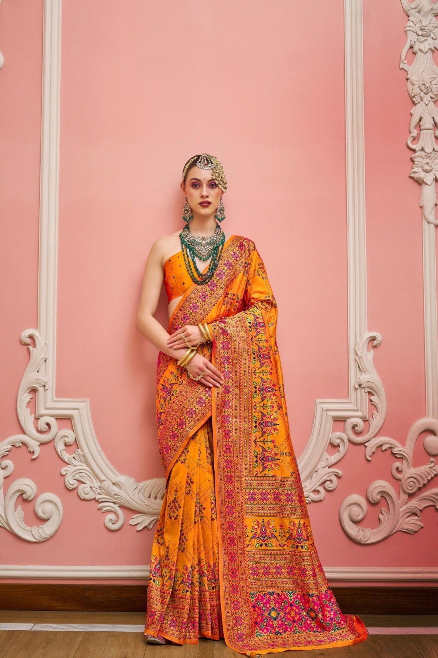 Vibrant Orange Banarasi Silk Saree With Traditional Patola Festive Wear