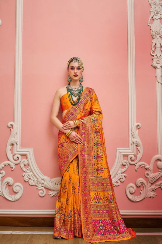 Vibrant Orange Banarasi Silk Saree With Traditional Patola Festive Wear