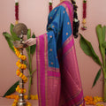 Deep Blue Silk Saree with Rani Pink Woven Border Traditional Design