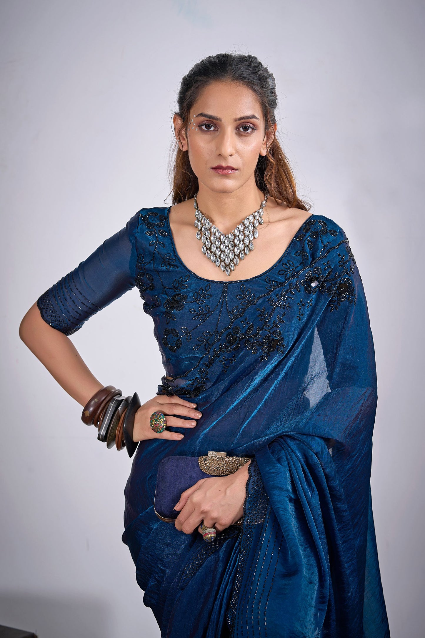 Teal Blue Organza Silk Saree with Black Embroidered Blouse