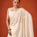 Cream Embroidered Georgette Saree Floral Motifs Designer Border