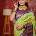 Parrot Green Kanjivaram Silk Saree Gold Zari Border Butti Work