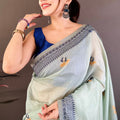 Elegant Mint Green Linen Cotton Saree Floral Print Pallu