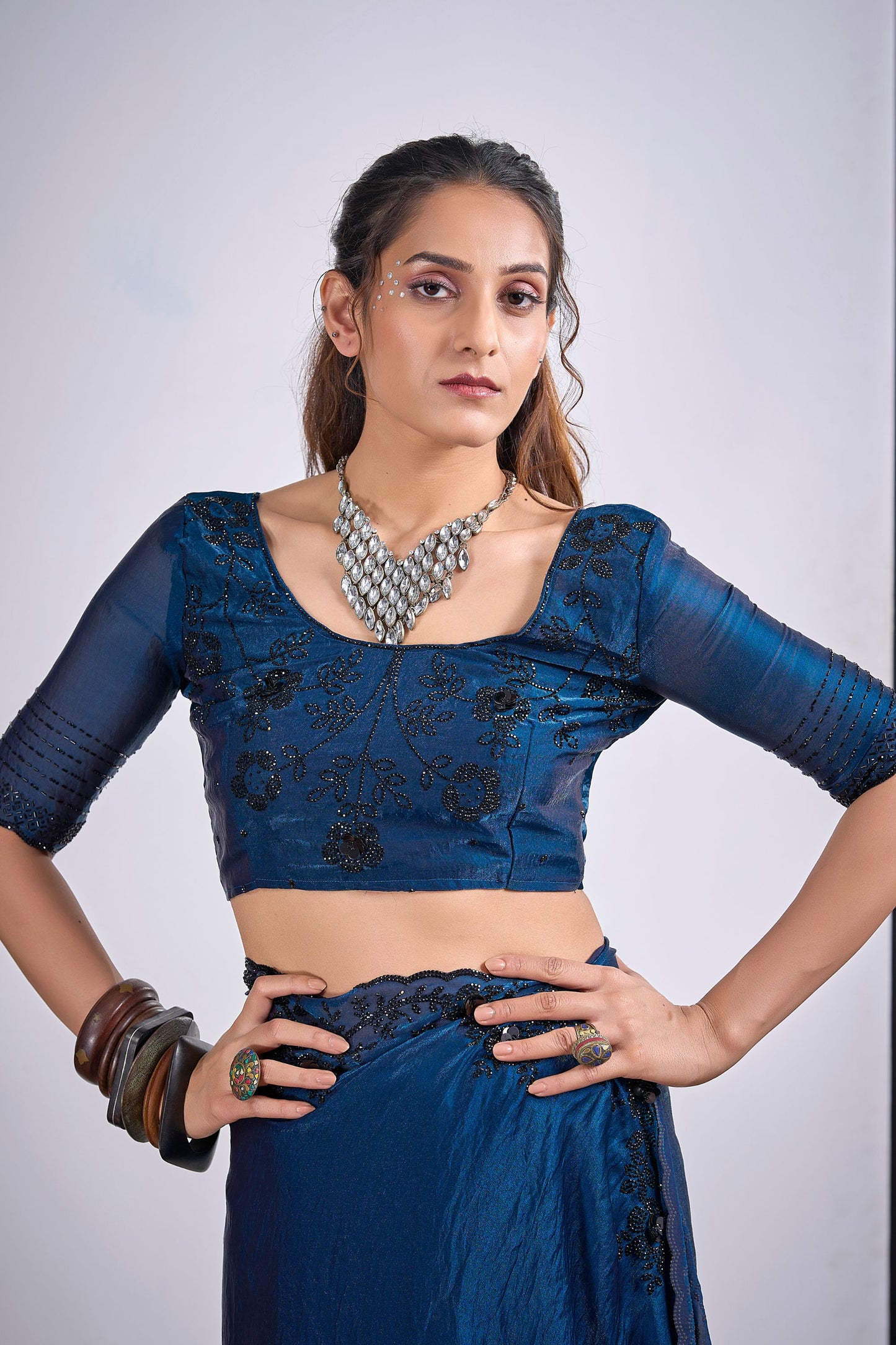 Teal Blue Organza Silk Saree with Black Embroidered Blouse