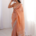 Elegant Peach Linen Designer Saree with Mirror Work Border