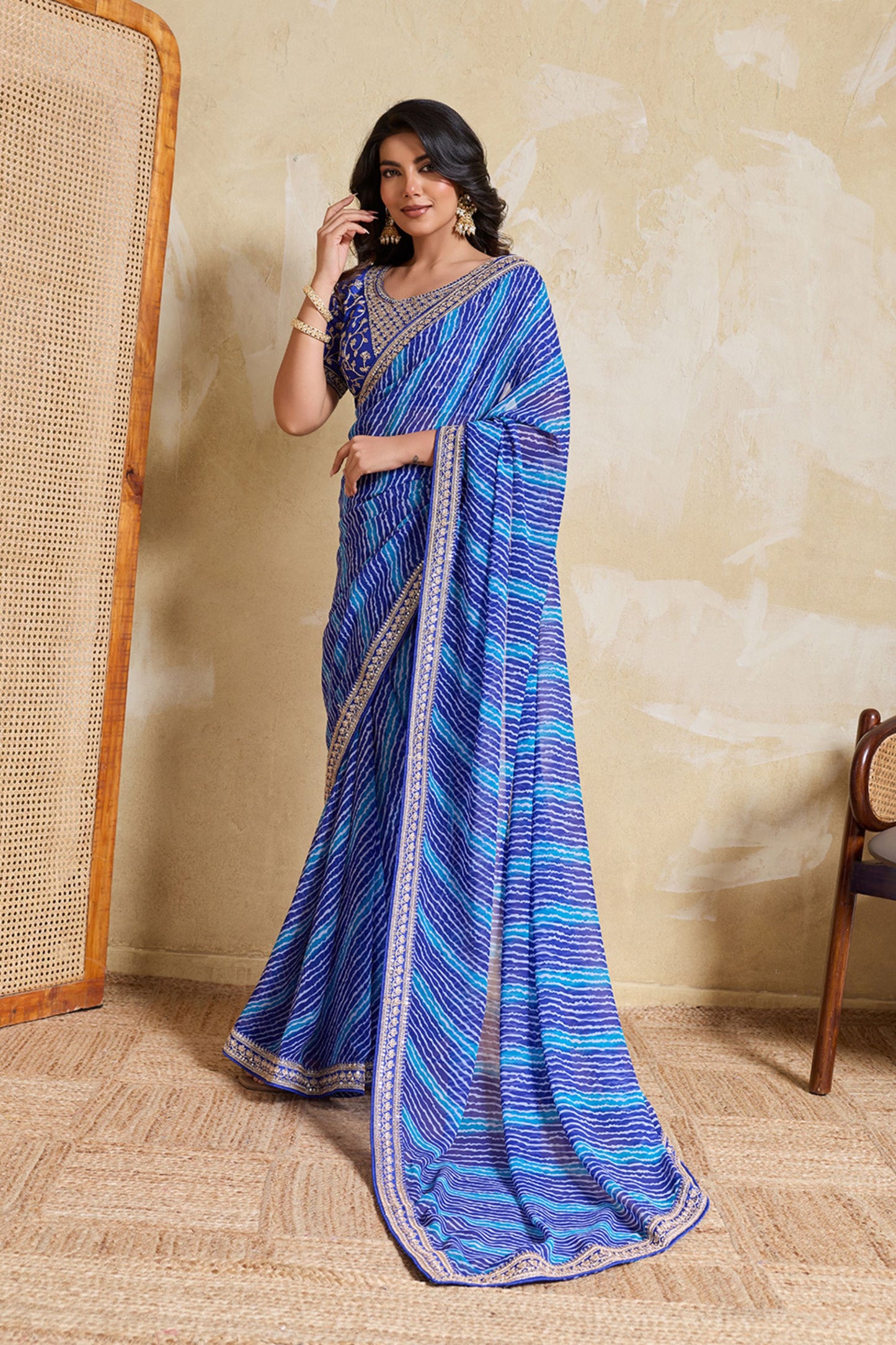 Blue Georgette Saree with Golden Embroidered Border Designer Blouse