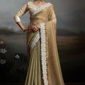 Gold and Pastel Green Silk Saree with White Lace Border