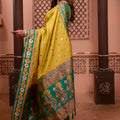 Yellow Silk Saree with Green Border Floral Zari Work Traditional Saree