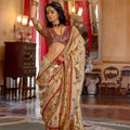 Golden Banarasi Silk Saree Red Border Floral Buti Weaving Traditional Wear Saree