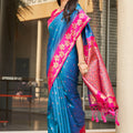Elegant Sky Blue Silk Saree with Pink Contrast Border Floral Zari Work