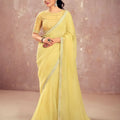 Pastel Yellow Georgette Saree with Embroidered Blouse Lace Border