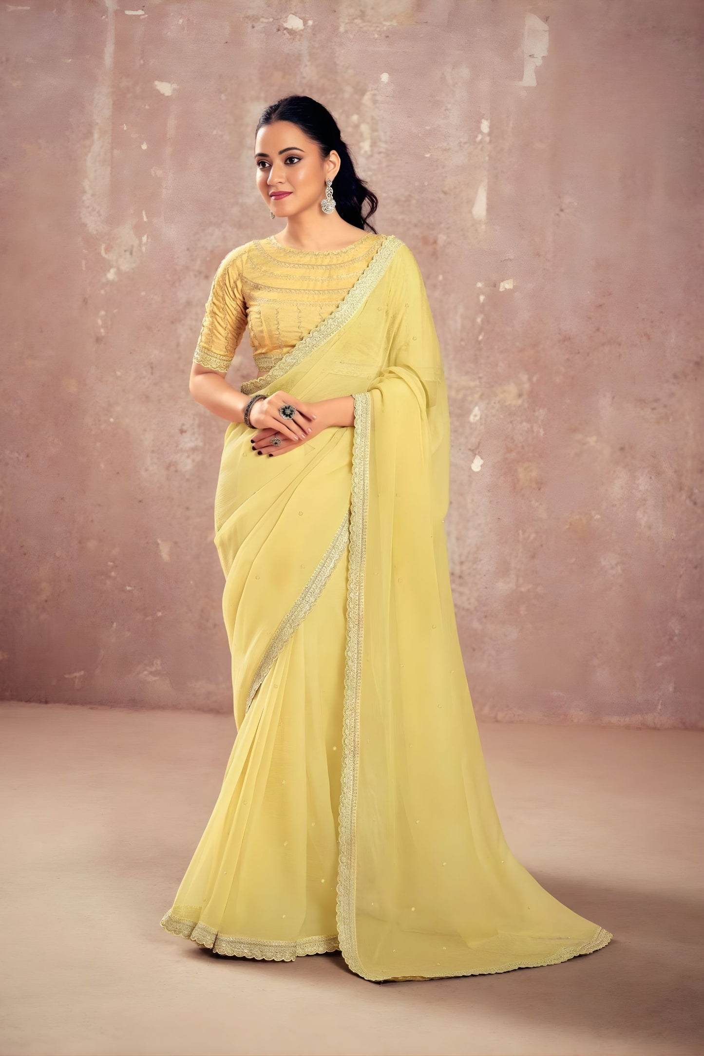 Pastel Yellow Georgette Saree with Embroidered Blouse Lace Border