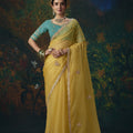 Radiant Yellow Silk Saree with Beads Work and Designer Border for Women