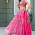 Vibrant Pink Art Silk Lehenga Choli with Heavy Embroidered Border and Matching Dupatta