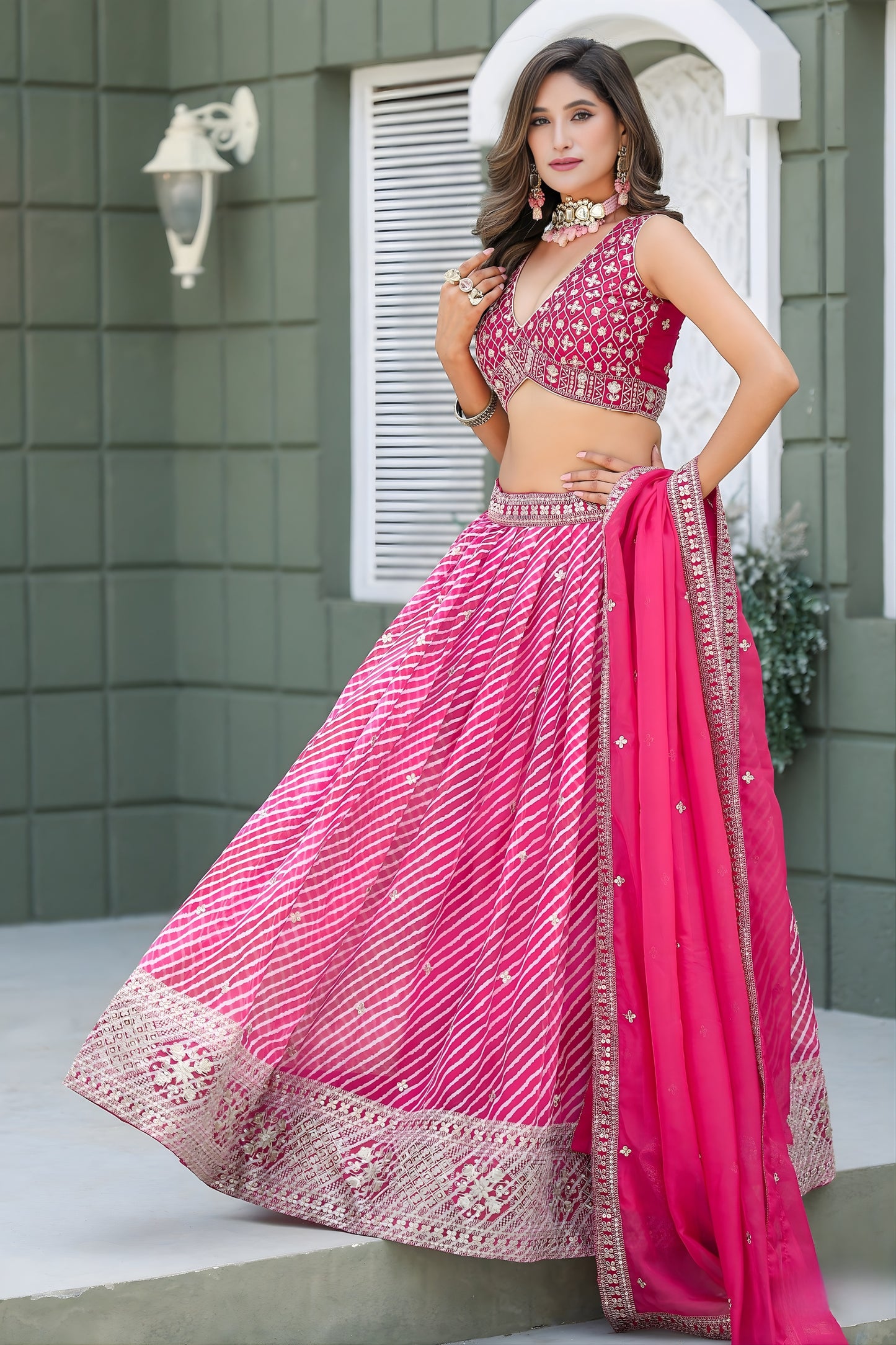 Vibrant Pink Art Silk Lehenga Choli with Heavy Embroidered Border and Matching Dupatta