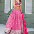 Vibrant Pink Art Silk Lehenga Choli with Heavy Embroidered Border and Matching Dupatta
