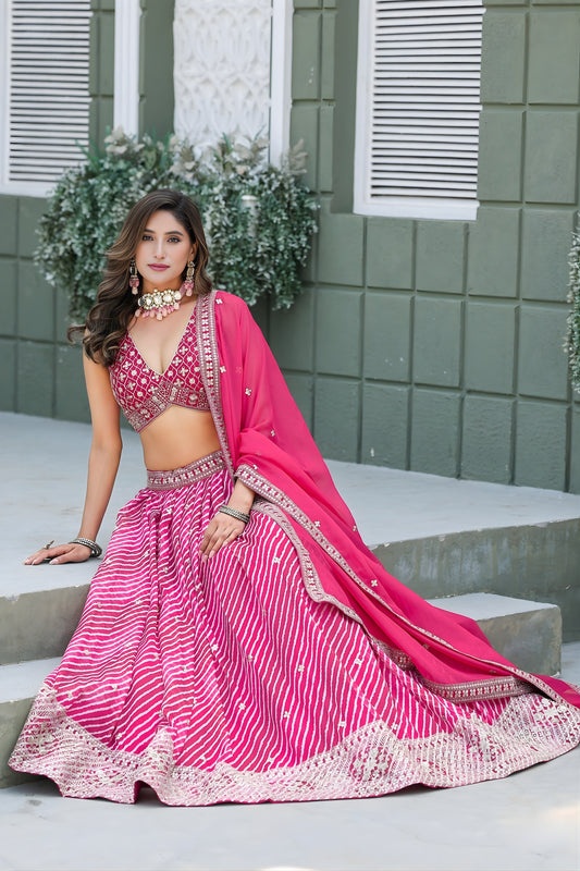 Vibrant Pink Art Silk Lehenga Choli with Heavy Embroidered Border and Matching Dupatta