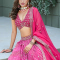 Vibrant Pink Art Silk Lehenga Choli with Heavy Embroidered Border and Matching Dupatta