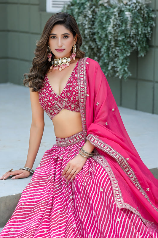 Vibrant Pink Art Silk Lehenga Choli with Heavy Embroidered Border and Matching Dupatta