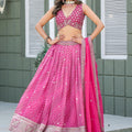 Vibrant Pink Art Silk Lehenga Choli with Heavy Embroidered Border and Matching Dupatta
