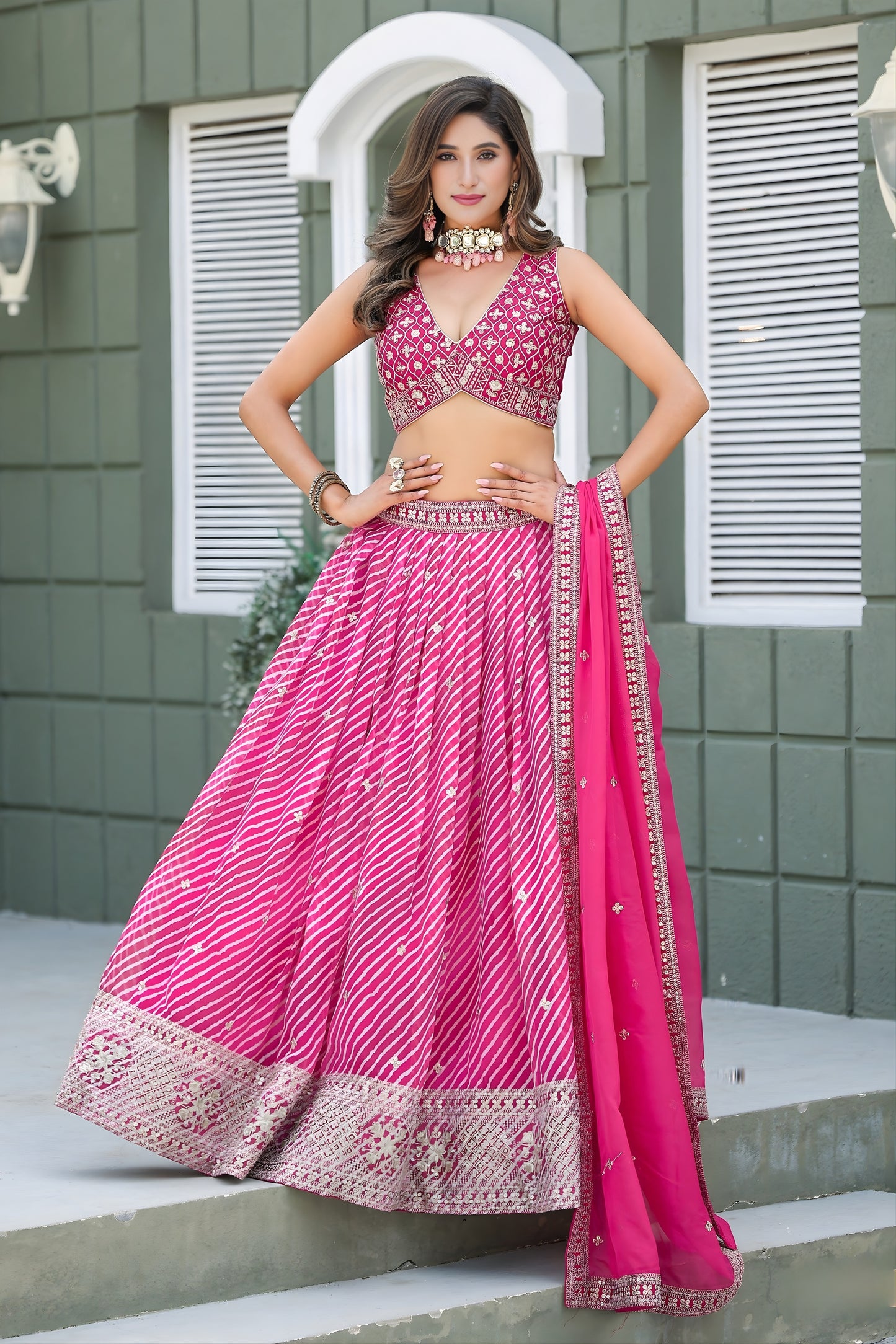 Vibrant Pink Art Silk Lehenga Choli with Heavy Embroidered Border and Matching Dupatta