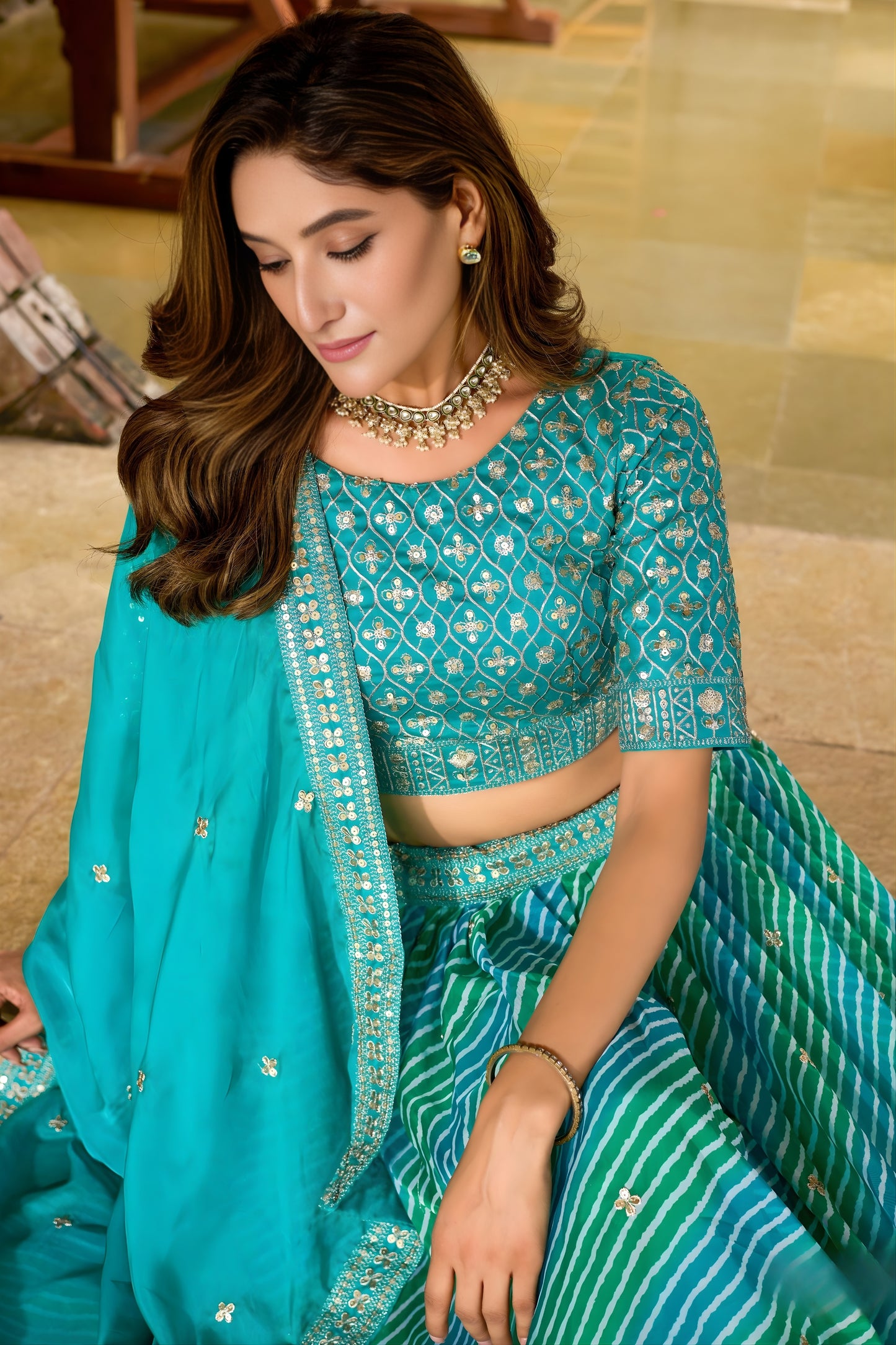 Glorious Sea Green Art Silk Lehenga Choli with Heavy Embroidered Border and Matching Dupatta