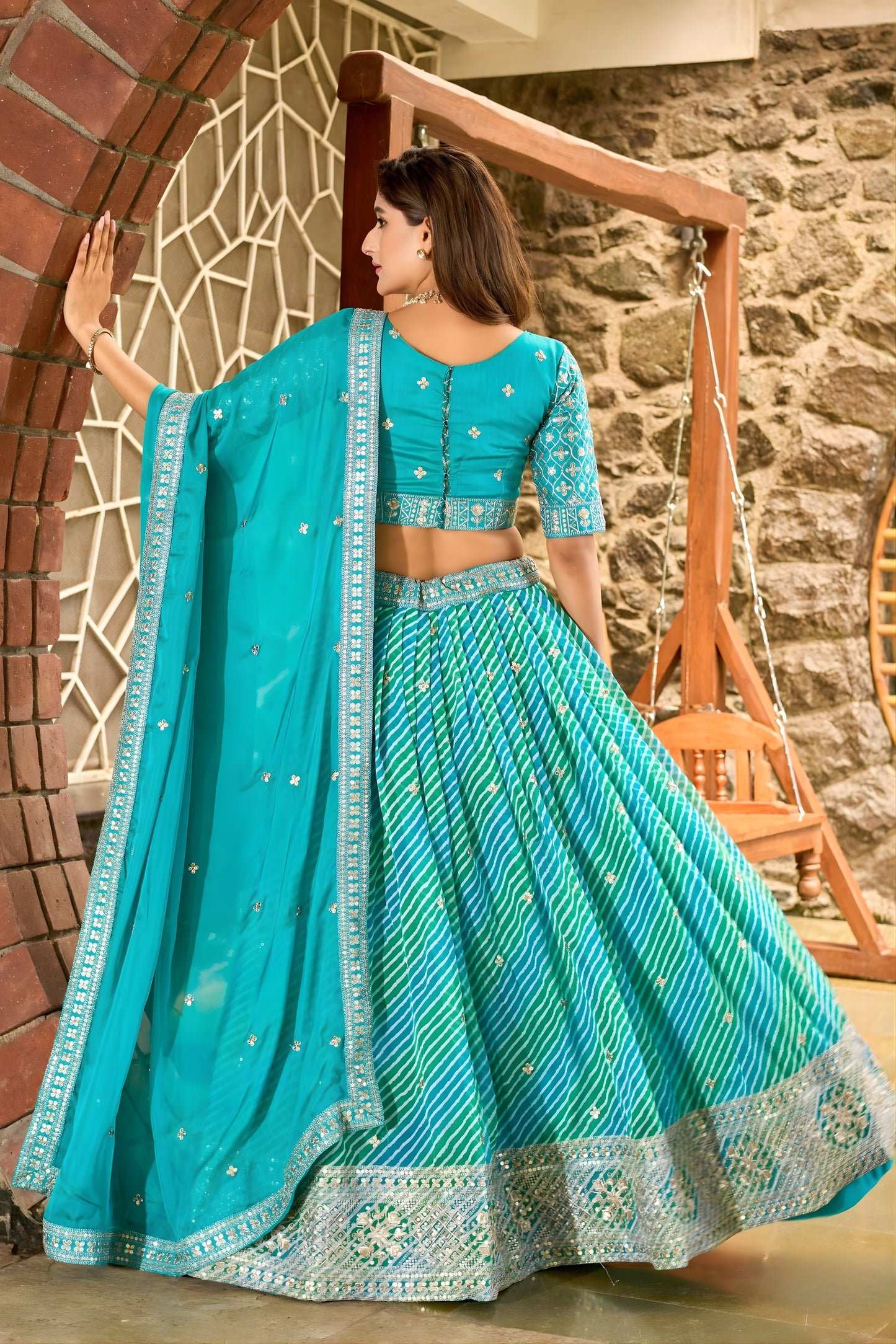 Glorious Sea Green Art Silk Lehenga Choli with Heavy Embroidered Border and Matching Dupatta