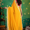 Mustard Yellow Bandhej Georgette Saree and Designer Blouse