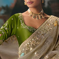 Beige Embroidered Silk Saree with Green Blouse Festive Wear